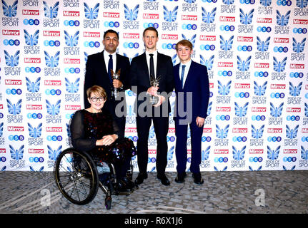 Ibi Ali (second left) and Luke Wigman (second right) with their Special Recognition Award presented by Billy Monger (right) and Baroness Tanni Grey-Thompson at the Pride of sport Awards 2018 at the Grosvenor House hotel, London. Stock Photo