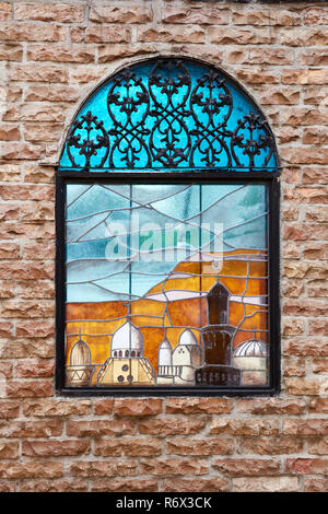 Stained glass window in the wall around the grave site of Elvis Presley in Memphis, Tennessee Stock Photo