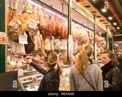 Horizontal portrait of customers inside the Mercato Centrale in Florence, Italy. Stock Photo