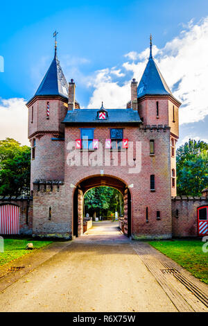 Beautiful Brick Entrance Gates at the famous Castle De Haar, a 14th century Castle that was rebuild in the late 19th century, in the Netherlands Stock Photo