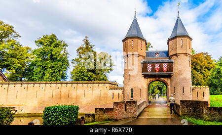 Beautiful Brick Entrance Gates at the famous Castle De Haar, a 14th century Castle that was rebuild in the late 19th century, in the Netherlands Stock Photo