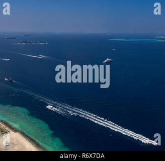 Boats and yachts near to Male International Airport in the Maldives Stock Photo