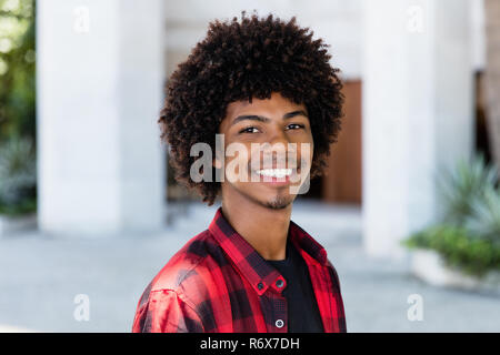 Portrit of an african american hipster man with afro hairstyle in the city Stock Photo