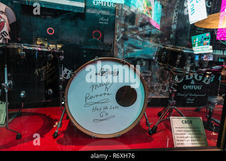 New York City, USA - July 30, 2018: Bass drum signed by Marky Ramone, drummer of the punk rock band the Ramones, in Hard Rock in Times Square at night Stock Photo