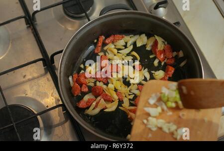 Cooking with sausages Stock Photo