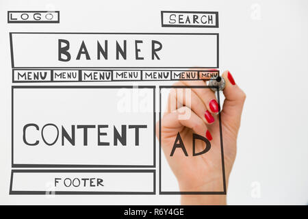 Designer drawing website development wire frame. Structure of web page. Web design Stock Photo