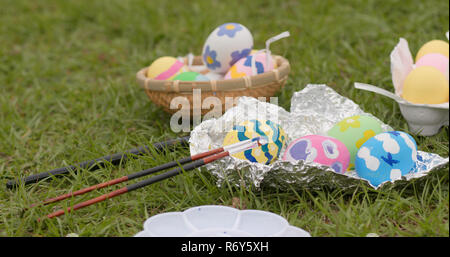 Drawing Easter egg on green grass Stock Photo