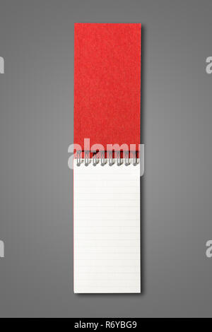 Blank open spiral notebook isolated on dark grey Stock Photo