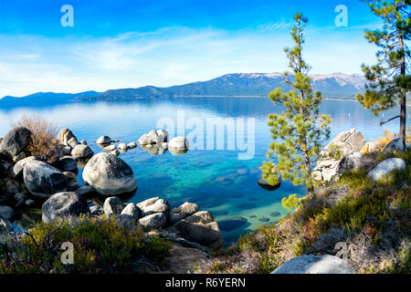 Sand Harbor in Lake Tahoe with pine trees and rocks Stock Photo