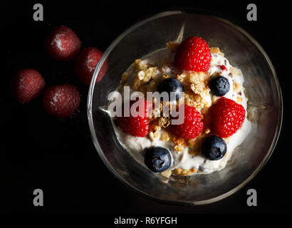 Yogurt bowl with raspberries. Stock Photo