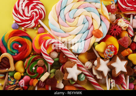 candies with jelly and sugar. colorful array of different childs sweets and treats Stock Photo