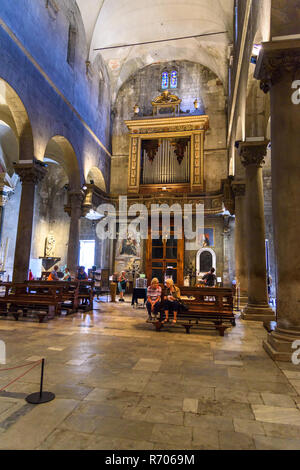 san michele lucca italy. the altar with a 12c crucifix and the