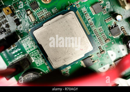 Close-up of electronic chip in desktop computer motherboard circuit. Stock Photo