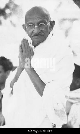 Mahatma Gandhi greeting by traditional Indian style folded hands namaste at Delhi India March 1939 old vintage 1900s picture Stock Photo