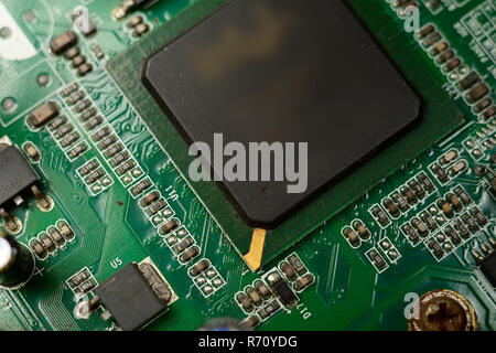 Close-up of electronic chip in desktop computer motherboard circuit. Stock Photo