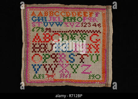 Sampler or lettercloth worked in multicolored wool on gray coarse matting canvas of cotton, ANNO 1861, lettercloth sampler embroidery needlework images wool cotton, textile embroidery cross stitch star stitch piece of coarse gray cotton in matting binding with an interwoven border in brown and red and blue along the edges. On the right selvedge and on the other sides hem edge of 0.5 cm wide. On the lap is embroided in cross stitch and star stitch in wool in the colors orange blue bright pink green dark red and bright red. Also embroided in yarn in different shades of red. and above the bottom  Stock Photo