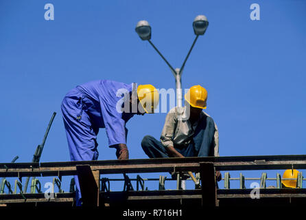 men constructing fly over at worli, Mumbai Bombay, Maharashtra, India Stock Photo