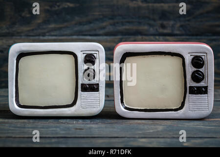 Retro Television Trinkets on Blue Background Stock Photo