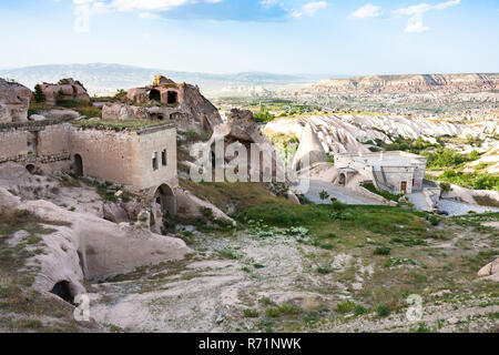 rock-cut houses in Uchisar village in Cappadocia Stock Photo