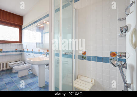 Normal bathroom with large shower in apartment interior Stock Photo
