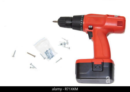 Screwdriver on a white background. Tools on a white background. Isolated objects. Items for the repair and collection of furniture. Stock Photo