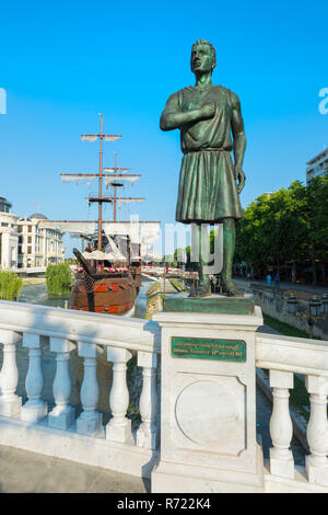 Galleon ship restaurant and bar on Vardar River and General Pakmenion statue, Skopje, Macedonia Stock Photo