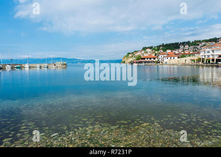 Ohrid old city reflecting in the marina, Macedonia Stock Photo