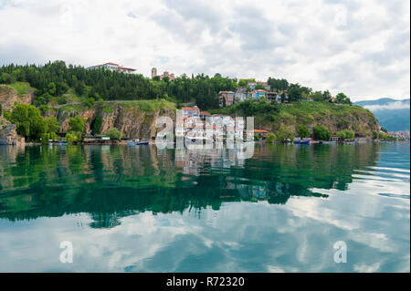 Ohrid old city reflecting in Lake Ohrid, Macedonia Stock Photo