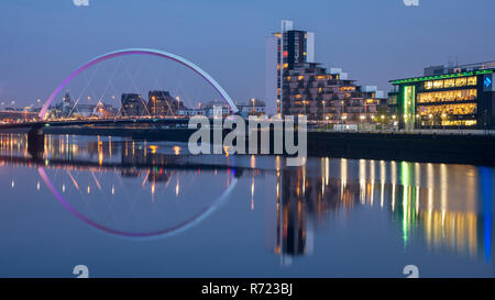 Glasgow, Scotland, UK - November 5, 2018: The Clyde Arc bridge and the offices and studios of STV are reflected in the waters of the River Clyde in Gl Stock Photo