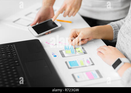 web designers creating mobile user interface Stock Photo