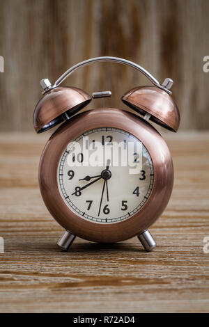 Old Fashioned Copper Alarm Clock Stock Photo