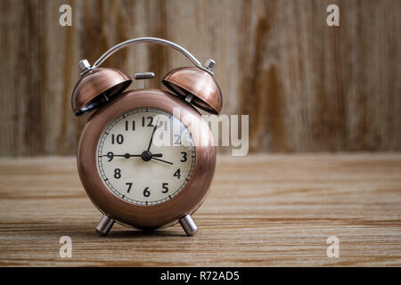 Old Fashioned Copper Alarm Clock Stock Photo