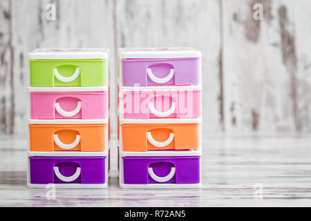 Small, Cute and Colorful Plastic Drawers on White Stock Photo