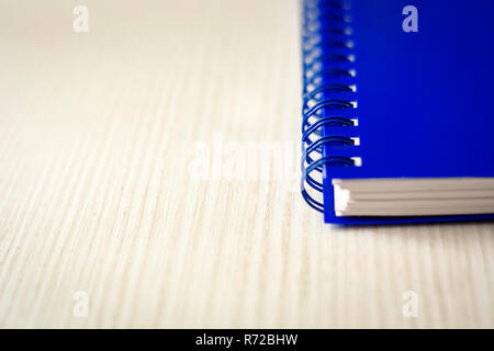 Spiral notebook isolated on a white table. Business and productivity concept. Spiral binding, stationery product Stock Photo