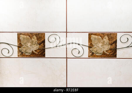 Brown leaves tile design with swirls for kitchen and bathroom Stock Photo