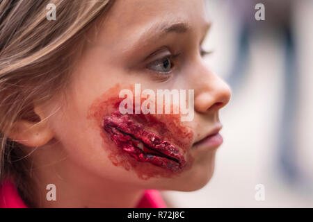 Girl Halloween Makeup.Halloween make up on face. Halloween . Stock Photo