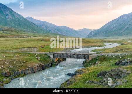 Wooden bridge over Mountain river, Naryn gorge, Naryn Region, Kyrgyzstan Stock Photo