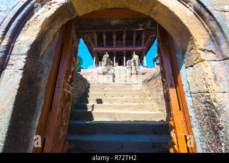 Ganesh Shrine, Uma Maheshwar Temple guarded by two stone elephants, Kirtipur, Nepal Stock Photo