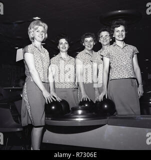 1960, historical, inside a ten-pin bowling hall, an adult male player ...