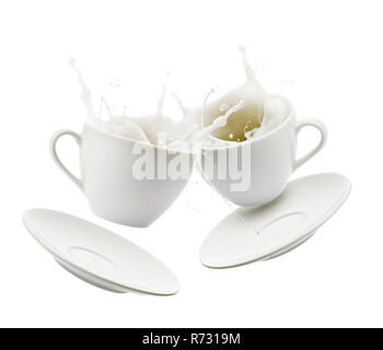 Cups full of milk bump and splashing, isolated on white background Stock Photo