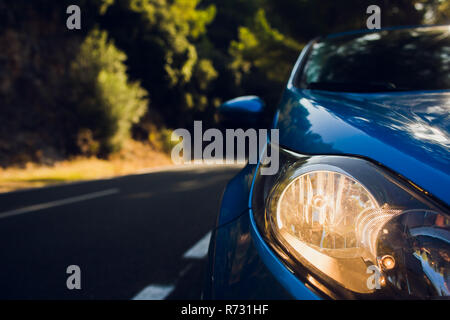 Great Car - Front side, half. On the road Stock Photo - Alamy