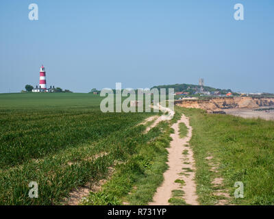 The Happisburgh lighthouse, in the Norfolk coastal village of Happisburgh Stock Photo