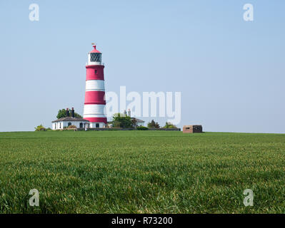 The Happisburgh lighthouse, in the Norfolk coastal village of Happisburgh Stock Photo