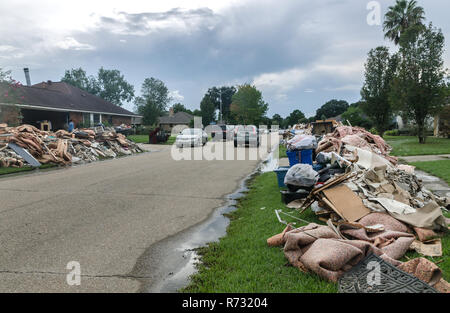 Unsalvageable household items line the curbs of Woodwick Avenue, Aug. 21, 2016, in Baton Rouge, Louisiana. Stock Photo
