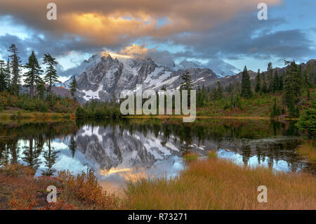 Mount Shuksan is a prominent mountain in the Pacific Northwest in the Mount Baker Wilderness Stock Photo