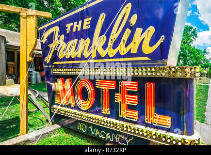 A sign from Franklin Motel sits on the front lawn at Biggar's Antiques in Chamblee, Georgia, June 10, 2014. The family-owned shop was founded in New Y Stock Photo