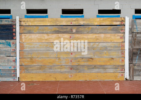 Facades covered with wooden planks to protect against winter weather and storms of the sea, and by possible malicious thieves Stock Photo