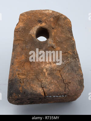 Red earthenware reinforcement, triangular with round head and hole, net reinforcement weighting soil finding ceramic earthenware, hole, hand-formed baked Hand-formed tapered earthenware with round hole. Glaze specks Two pieces with shrinkage cracks occur during the drying of the earthenware archeology underground pit Rotterdam City Triangle Groenendaal indigenous pottery catch fish fisherman seine stone Soil discovery around large cesspool underground pit Groenendaal at approximately 60 meters approximately 2,5 meters - N..P September 15, 1975. Stock Photo