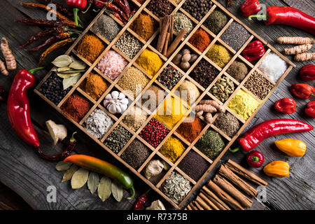 Assorted Spices in a wooden box Stock Photo