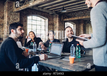 Designers having meeting in studio Stock Photo